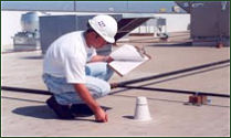 Commercial roof inspection, restoration, repair, and service by J. Wilhelm Roofing Company
